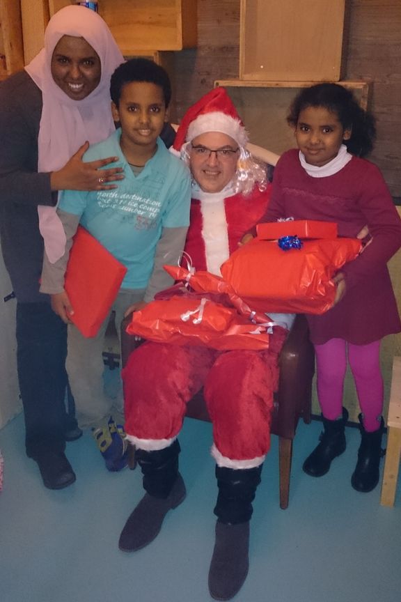 Pose photo en famille avec le Père Noël